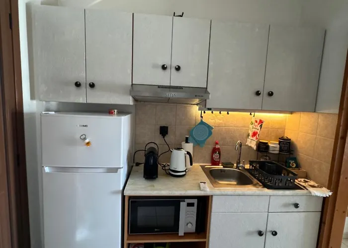 Апартаменты Breathe Easy Living Тигаки